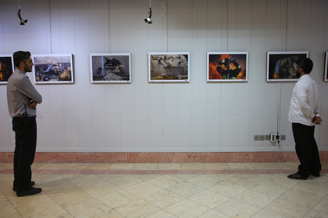 نمایشگاه عکس «آتشواره» در قم گشایش یافت +تصاویر